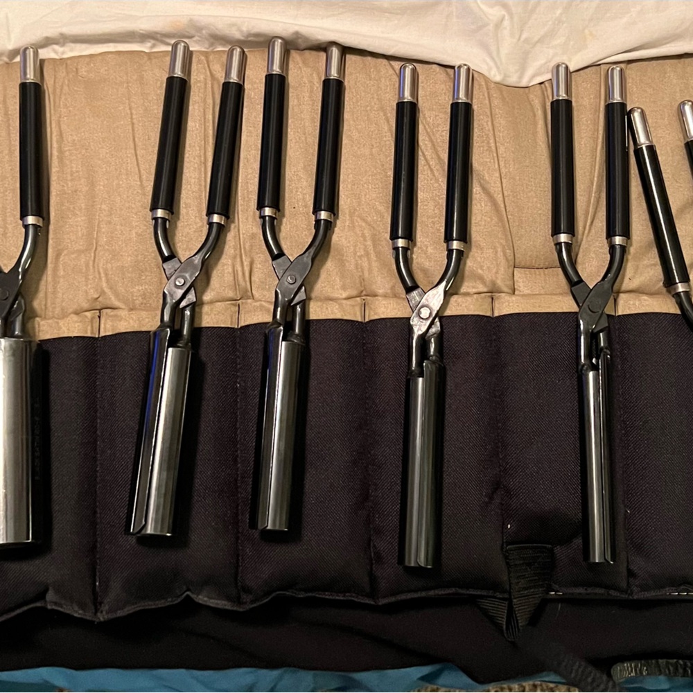Set of Marcel curling irons and carrying case